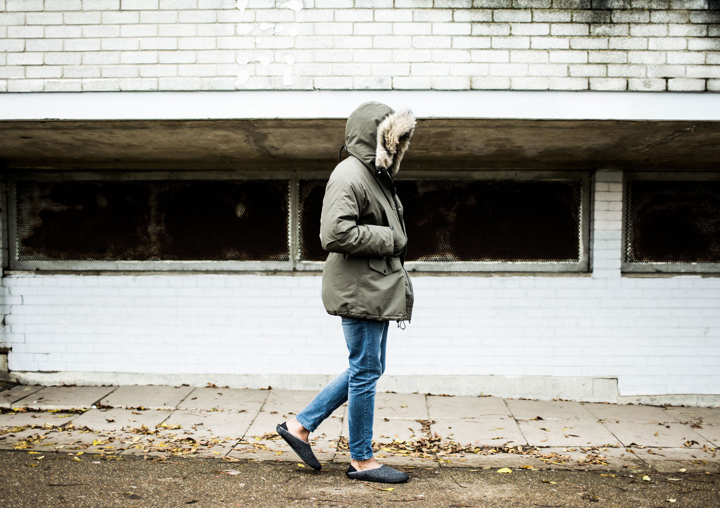 walking outside in mahabis classic grey slipper with skien black detachable outdoor sole // about mahabis
